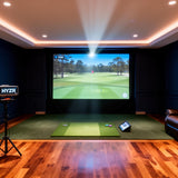 HYZR Elite open-room simulator bay with leather lounge seating