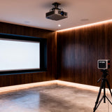 HYZR Elite wall-integrated simulator bay with walnut feature wall